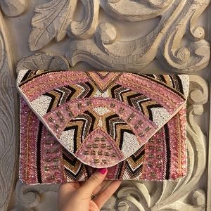 Pink white gold black silver envelope clutch with gold crossbody chain strap